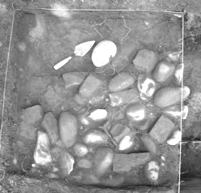 Cobblestones from the Flint House archaeological excavation in porch square I2